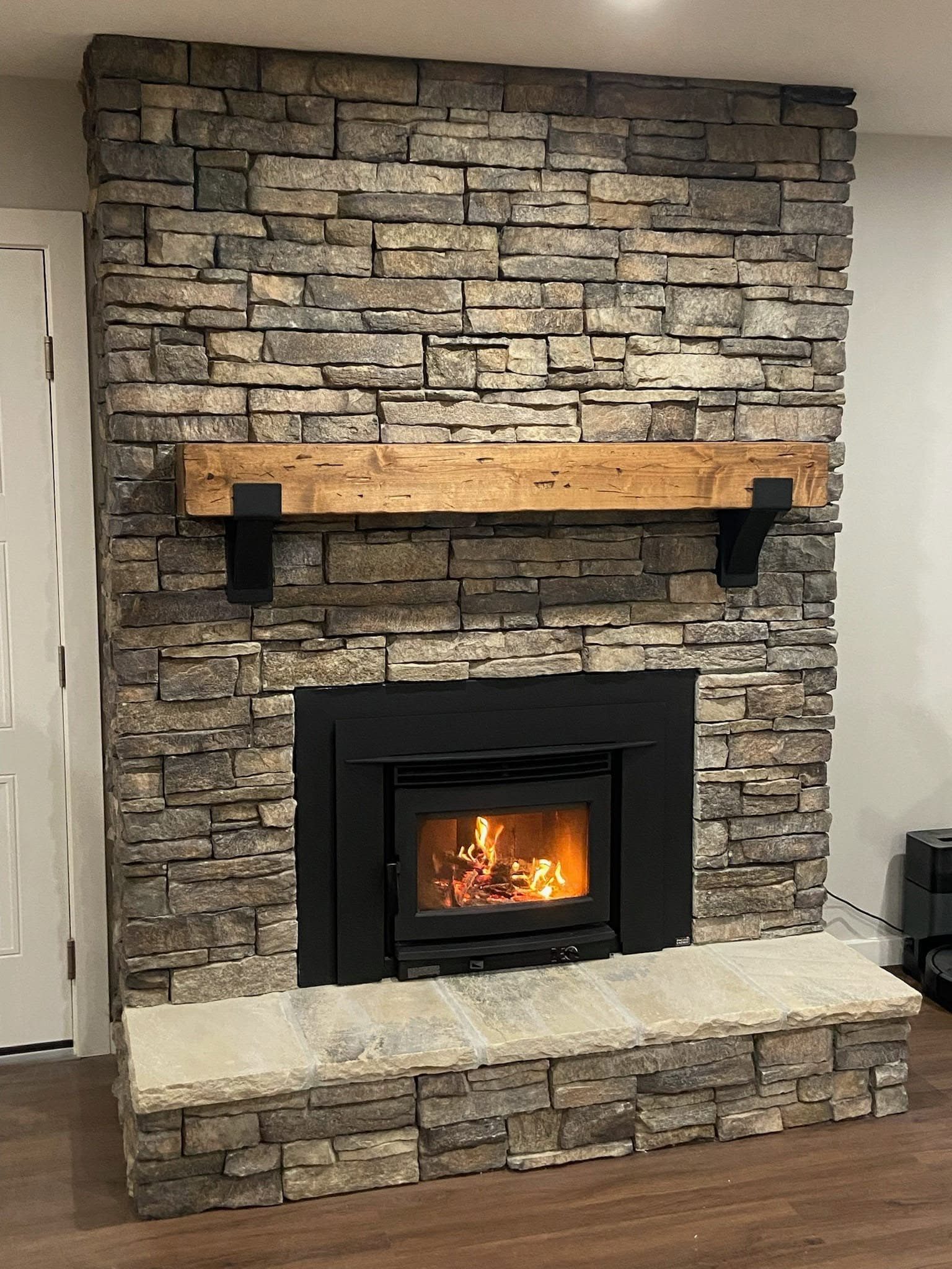 A new fireplace and chimney system built into an existing home.